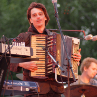 A man playing an accordion at the Dzelzs vilks ielīgo '09 festival.