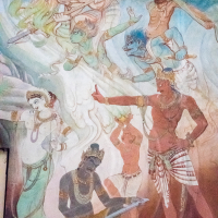 A vibrant mural depicts mythological figures from India adorned with ornate jewelry and expressive poses. One figure sits playing a lute, while others dance energetically. Flowing garments and dynamic colors enhance the scene, set against ethereal clouds and abstract patterns for a mystical atmosphere.