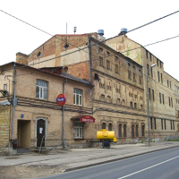 A brick building in Iļģuciems.