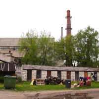 A Iļģuciems building with a chimney.