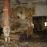 A Iļģuciems room with a dirty floor.