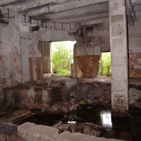 A Iļģuciems room with a dirty floor.