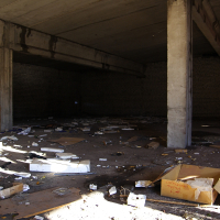 A Skulte room with a lot of debris on the floor.
