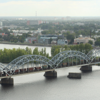 A picturesque bridge spanning over a river, offering breathtaking views of Riga from above.