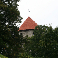 A red-roofed brick building in Tallinn.