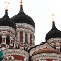A Tallinn church with a clock on top.