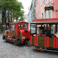 A red and black train in Tallinn.
