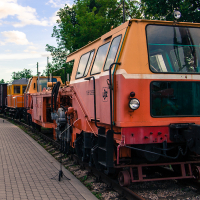 A train museum showcases a parked train on a track.