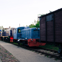 A train is parked at a train museum.