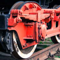 Close-up, red train wheels.