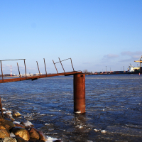 A Voleri bridge spanning a body of water.