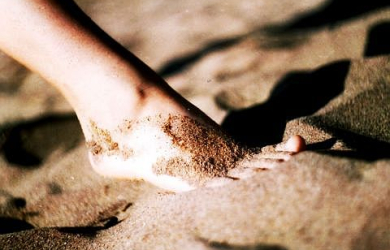 A Foot On Sand.