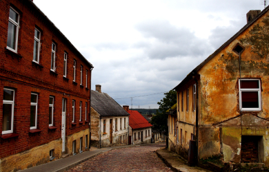 A Cobblestone Street In The Town Of Kandava.