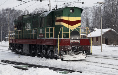 Old Locomotive In Snow