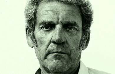 A Black And White Photo Of An Older Man Named Ruudi.