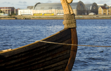 A Viking Boat On Water.